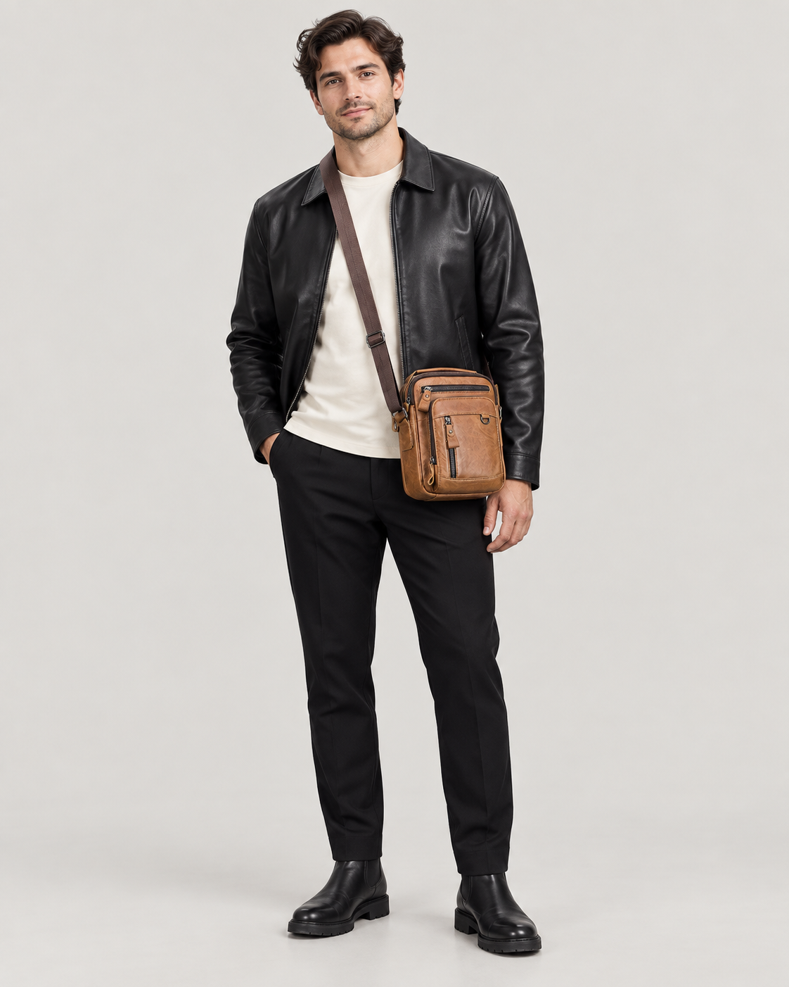 EKROZ caramel brown leather crossbody bag worn by model